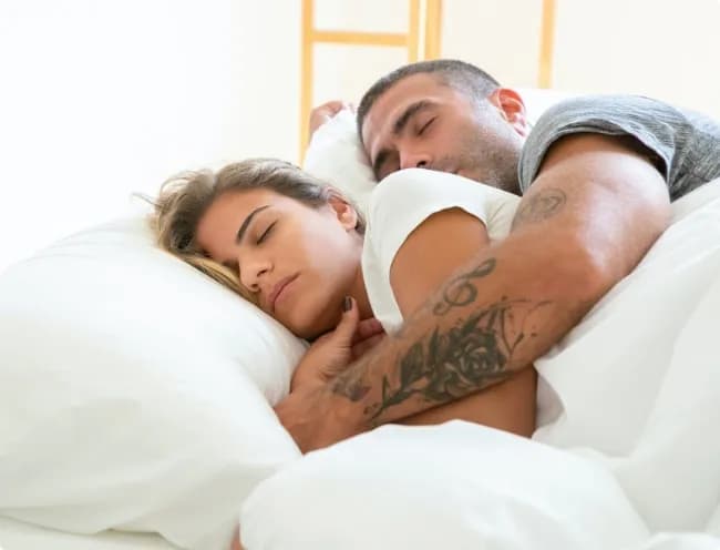 Couple sleeping peacefully